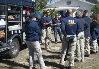 image of criminal justice students participating in field study with FBI